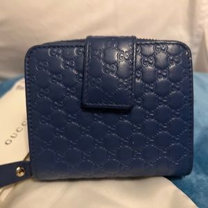 Authentic Gucci GG Embossed Blue Leather Wallet